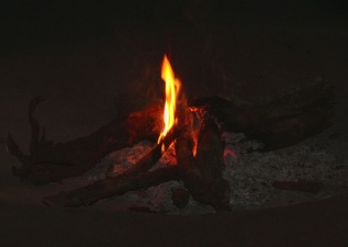 Cooking fire in traditional Zulu hut Shakaland Zulu Village in Kwa-Zulu Natal region of South Africa.